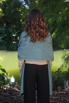 Woman wearing Lothlorian - Merino & Possum Brando Wrap (9993) in the colour Sage.