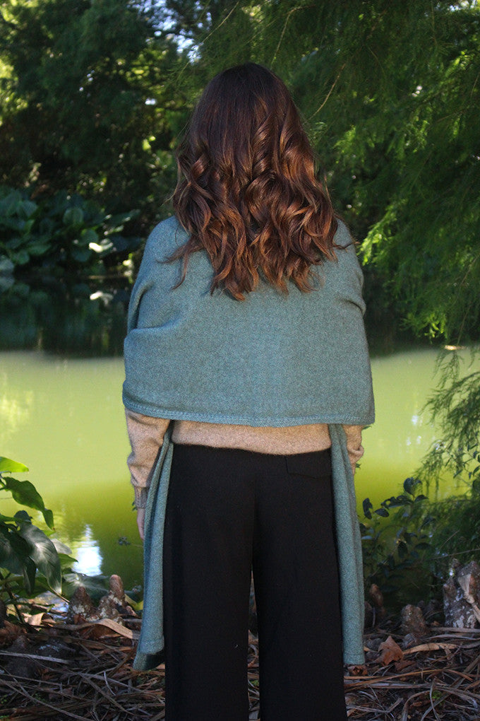 Woman wearing Lothlorian - Merino & Possum Brando Wrap (9993) in the colour Sage.
