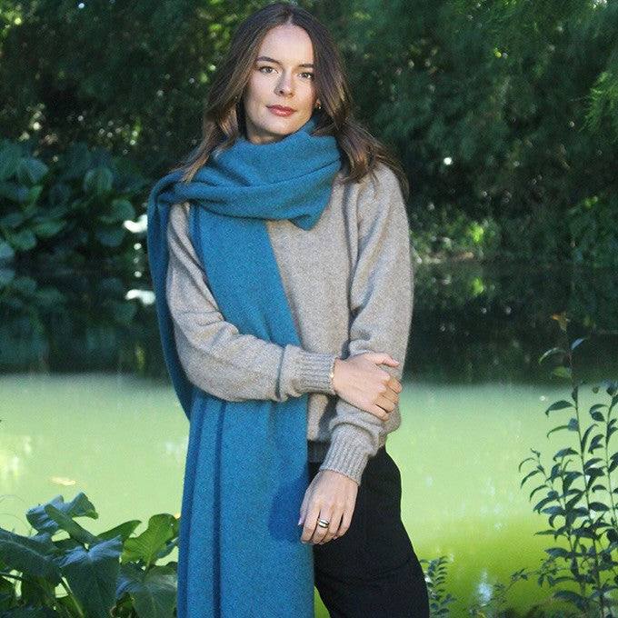 Woman wearing Lothlorian - Merino & Possum Brando Wrap (9993) in the colour Teal.