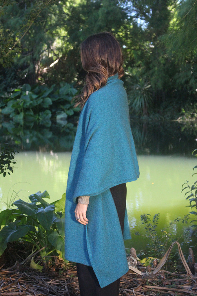 Woman wearing Lothlorian - Merino & Possum Brando Wrap (9993) in the colour Teal.