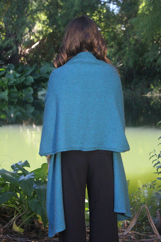 Woman wearing Lothlorian - Merino & Possum Brando Wrap (9993) in the colour Teal.