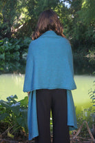 Woman wearing Lothlorian - Merino & Possum Brando Wrap (9993) in the colour Teal.