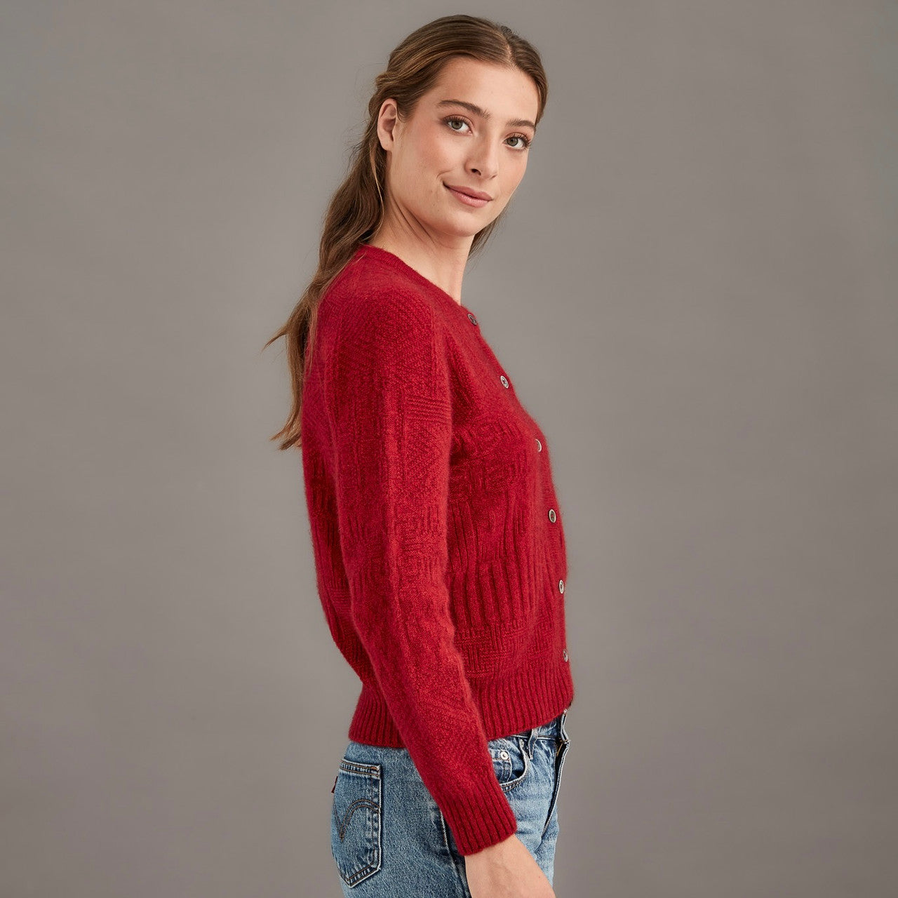 Woman wearing McDonald - Merino & Possum Patchwork Cardigan (5062) in the colour Red.