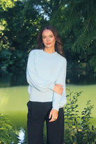 Woman wearing the Lothlorian - Alpaca Chime Jumper (ALP079) in the colour Aqua.