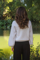 Woman wearing the Lothlorian - Alpaca Chime Jumper (ALP079) in the colour Dove.