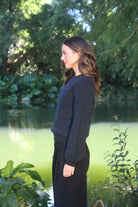 Woman wearing the Lothlorian - Alpaca Chime Jumper (ALP079) in the colour Slate.