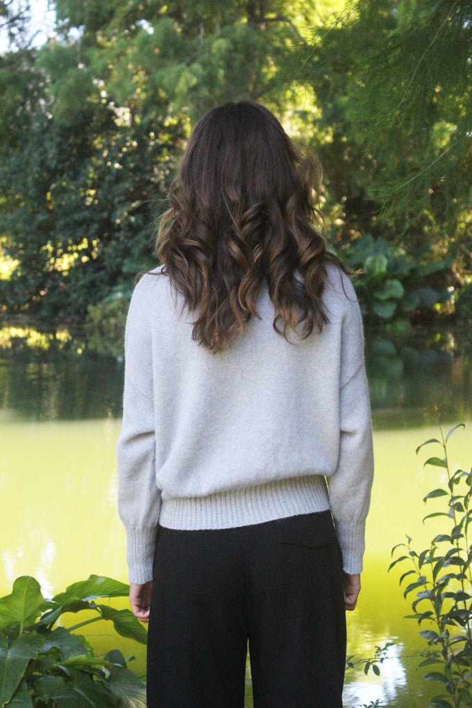 Woman wearing Lothlorian - Alpaca Enclave Cardigan (ALP080) in the colour Dove.
