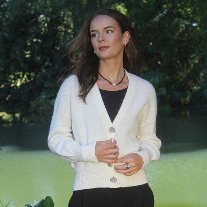 Woman wearing Lothlorian - Alpaca Enclave Cardigan (ALP080) in the colour Natural.