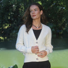 Woman wearing Lothlorian - Alpaca Enclave Cardigan (ALP080) in the colour Natural.