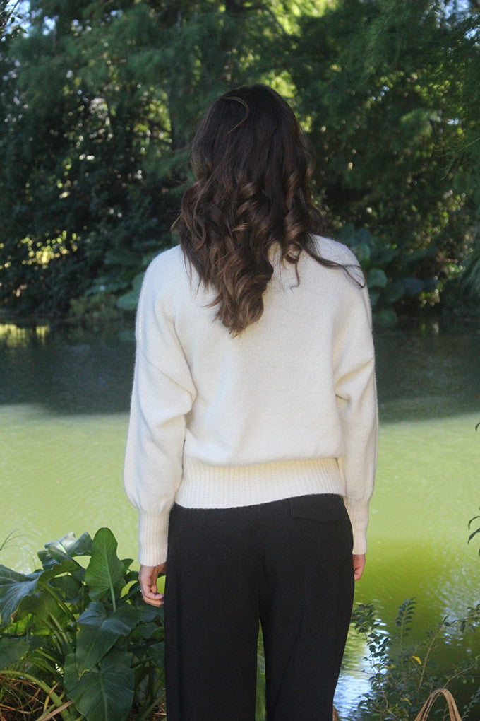 Woman wearing Lothlorian - Alpaca Enclave Cardigan (ALP080) in the colour Natural.