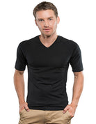 Man wearing Merino short black sleeve thermal top.