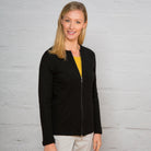 Woman wearing zipped Catherine Cardigan in Black