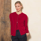Woman wearing zipped Catherine Cardigan in Portobello