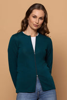 Woman wearing zipped Catherine Cardigan in Dragonfly.