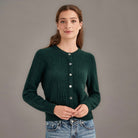 Woman wearing McDonald - Merino & Possum Patchwork Cardigan (5062) in the colour Forest.