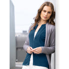 Woman wearing zipped Catherine Cardigan in Tui