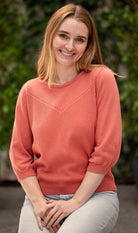 Woman wearing Country Laine - Cotton Eyelet Yoke Jumper (CL0094) in the colour Sienna.