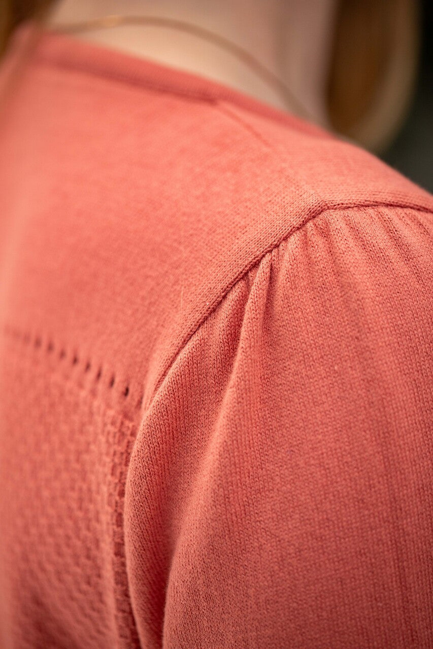 Woman wearing Country Laine - Cotton Eyelet Yoke Jumper (CL0094) in the colour Sienna.