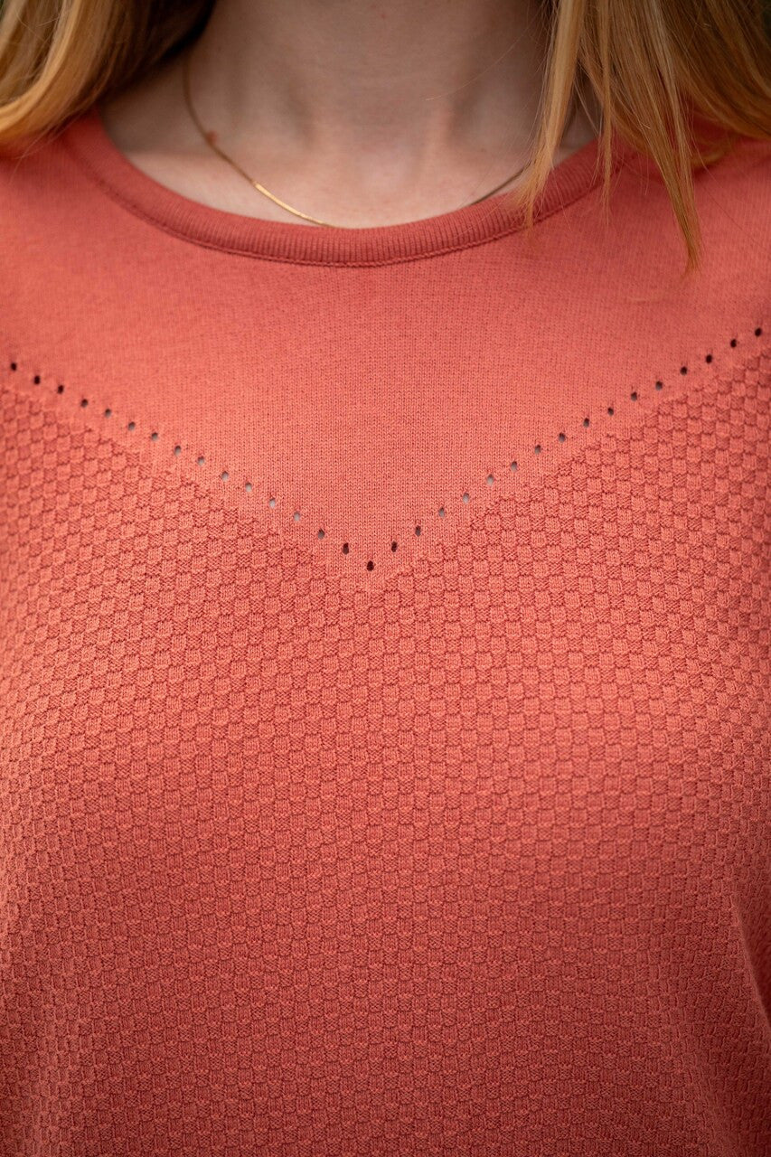 Woman wearing Country Laine - Cotton Eyelet Yoke Jumper (CL0094) in the colour Sienna.
