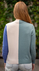 Woman wearing Country Laine - Cotton Harlequin Jumper (CL0098) in the colour Wild Sage/Sand/Blue Jay.