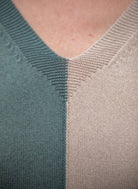 Woman wearing Country Laine - Cotton Harlequin Jumper (CL0098) in the colour Wild Sage/Sand/Blue Jay.