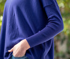 Woman wearing Country Laine - High Neck Sway Jumper (CL0122-IND2026) in the colour Atlantic.