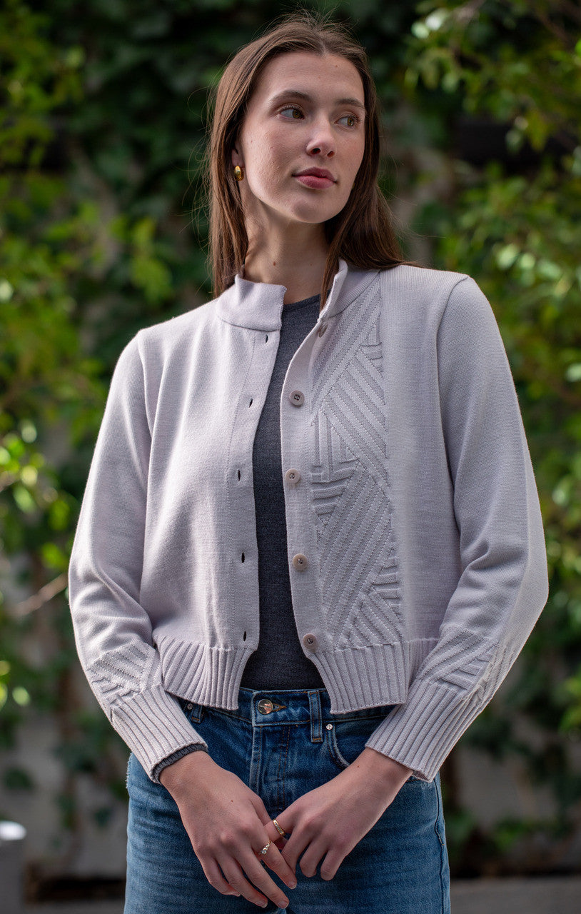 Woman wearing Country Laine - Diagonal Cardi (CL0126-IND2026) in the colour Cement.