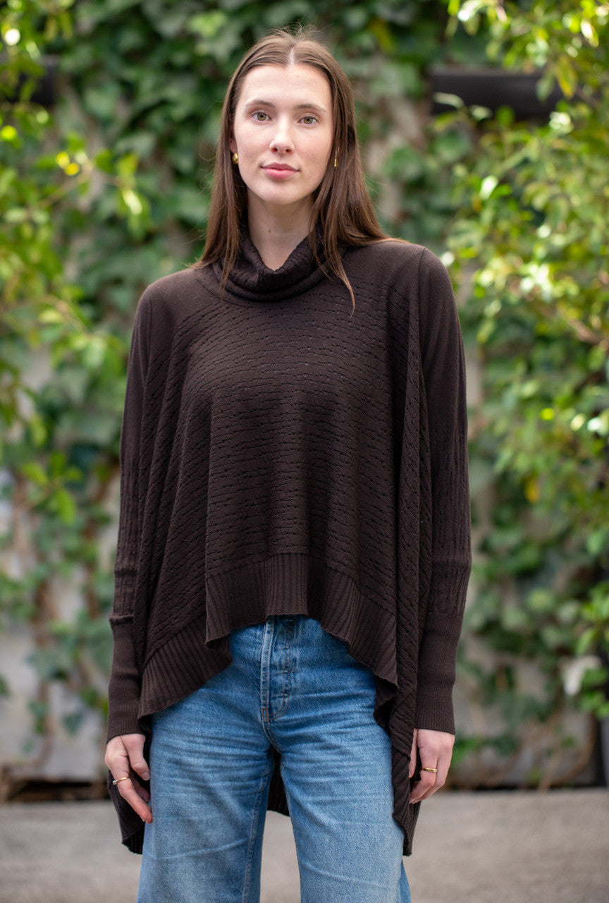 Woman wearing Country Laine - The Nest Top (CL0130-IND2026) in the colour Chocolate.