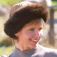Woman wearing a Tan coloured Four Peaks Classic Panelled Lambskin & Possum Fur Hat.