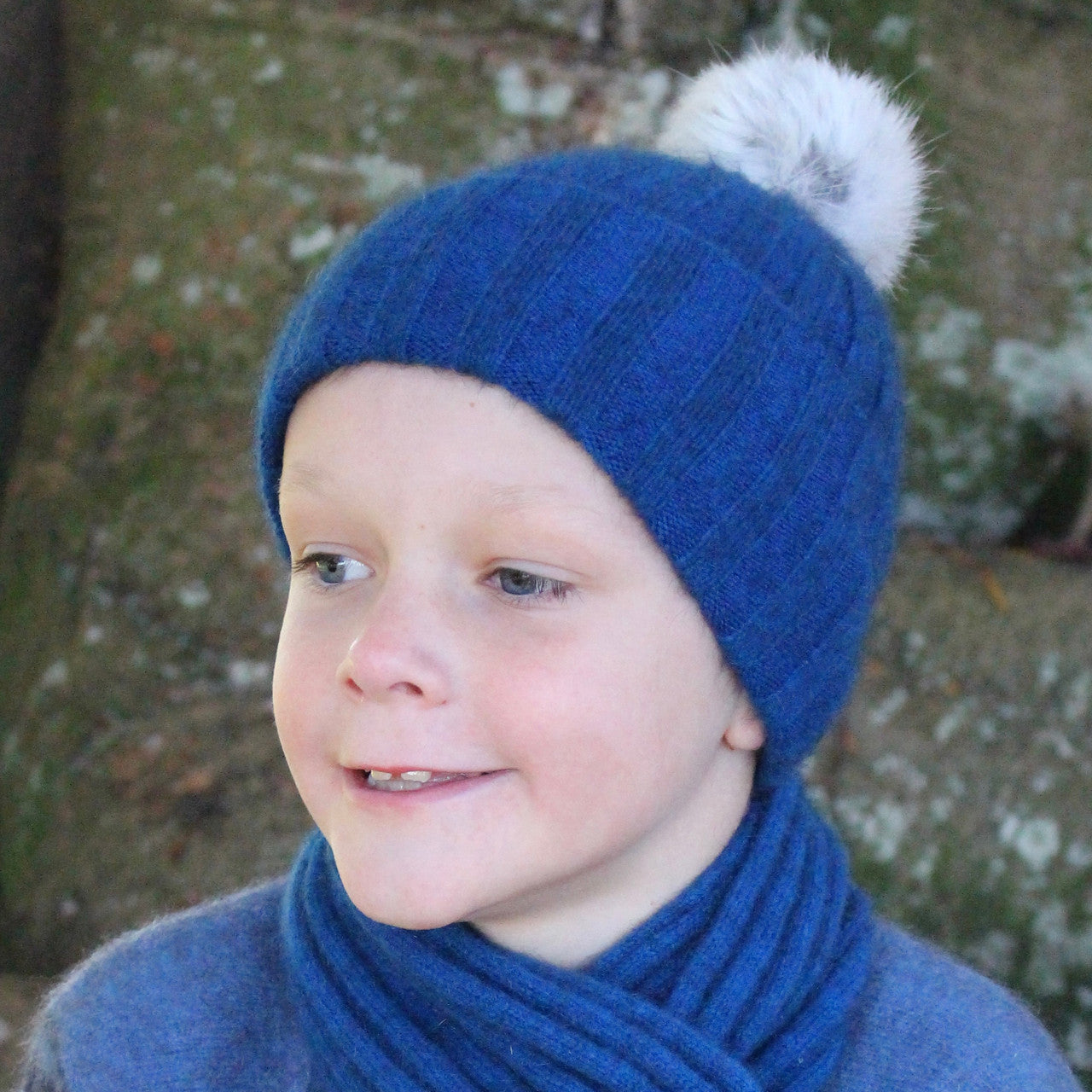 Child wearing beanie. Colour Lagoon