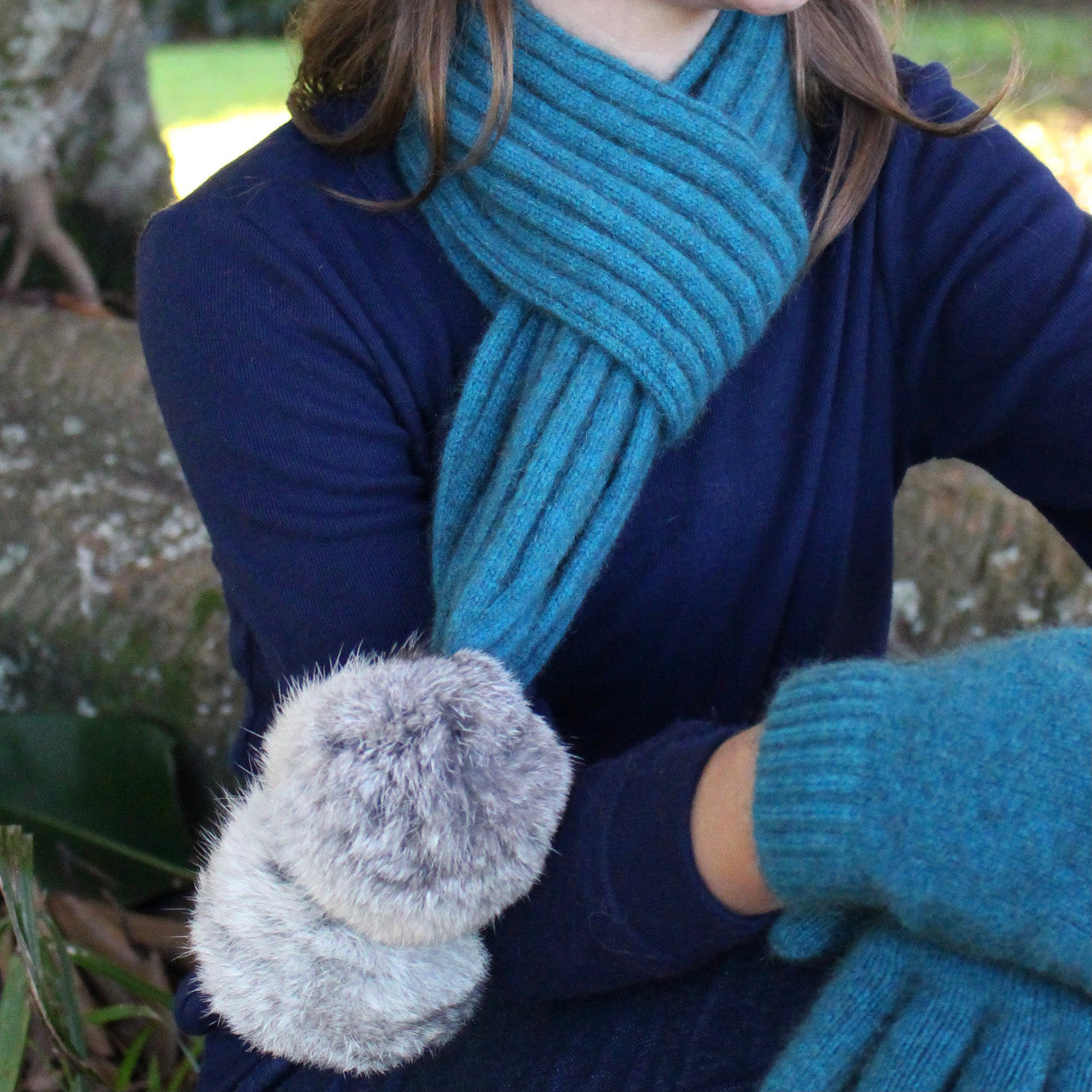 Girl wearing teal colour scarf