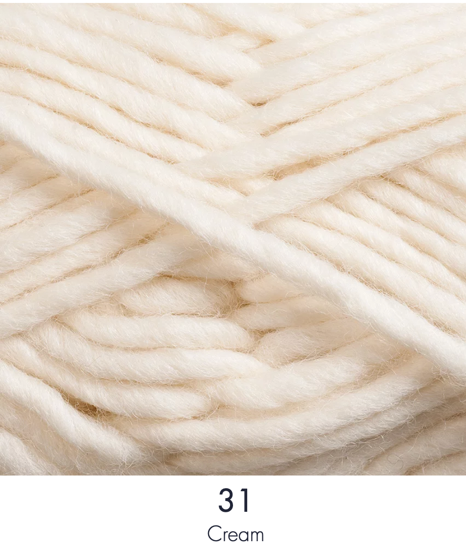 Close up ball of yarn in colour cream.
