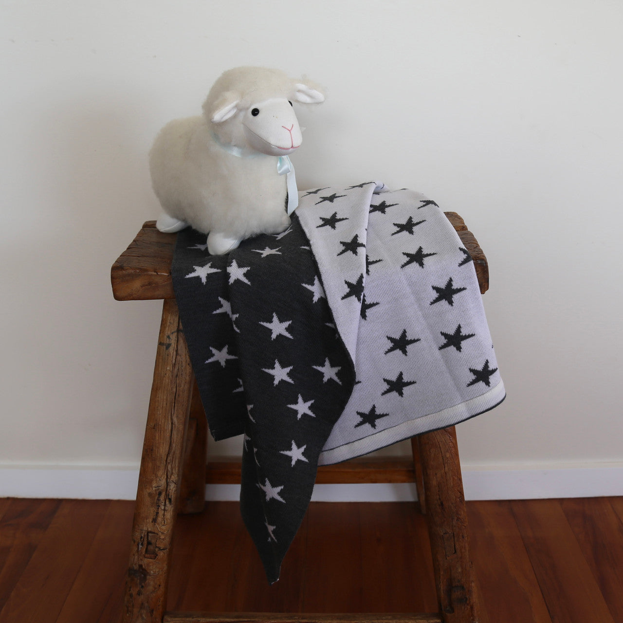 Babies Cot Blanket in colour Dark Grey & Off White.