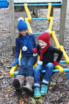 Girl wearing lagoon colour & boy wearing red colour scarf, beanie and glove set.