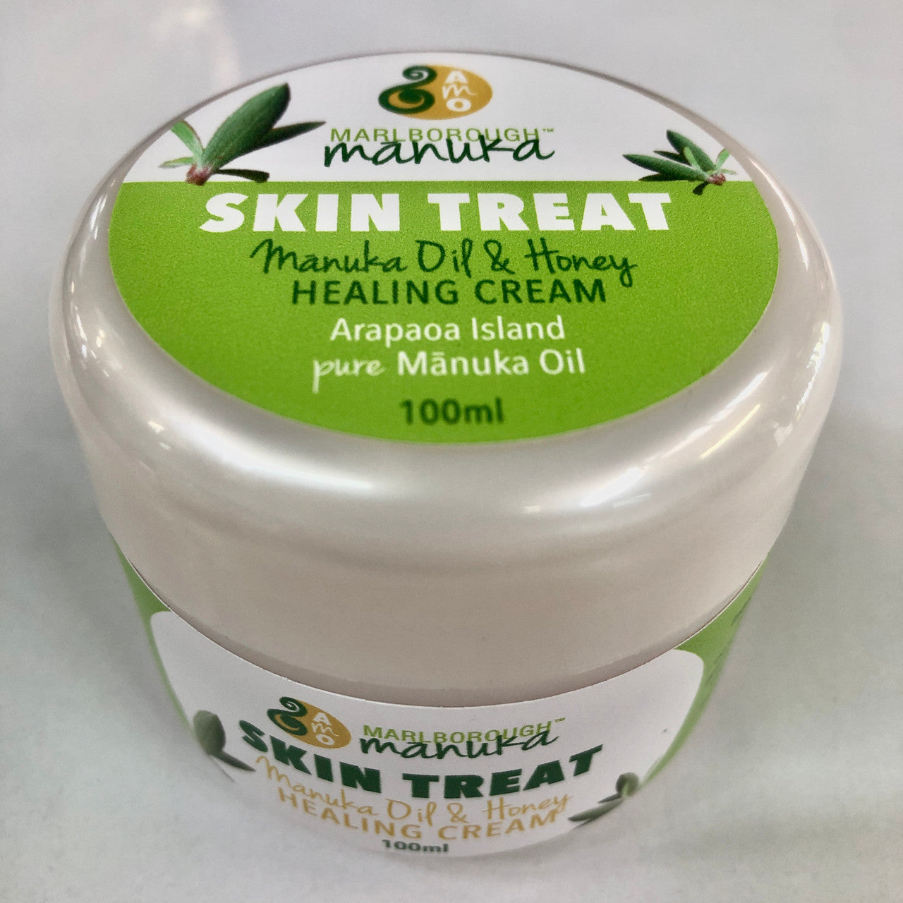 Side view of 100ml pot of healing cream.