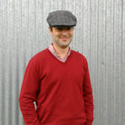 Man wearing Traditional Cheesecutter Deluxe hat in hunston black colour.