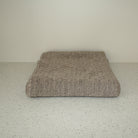 Bauge coloured baby eyelet blanket.