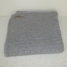 Grey coloured baby eyelet blanket.