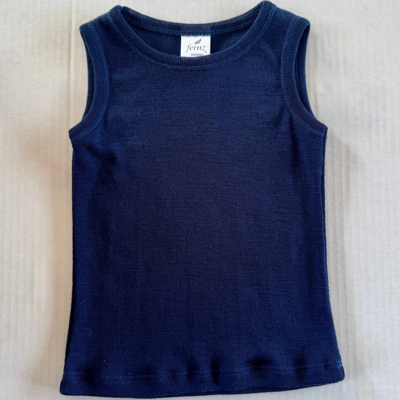 Merino wool baby’s singlet in Navy colour.