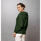 Woman wearing Noble Wilde - Merino and Possum Oulu Hoodie (NW3231) in the colour Jungle.