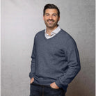 Man wearing the Noble Wilde - Merino & Possum Oxford Vee Sweater (NW1002) in the colour Neptune.
