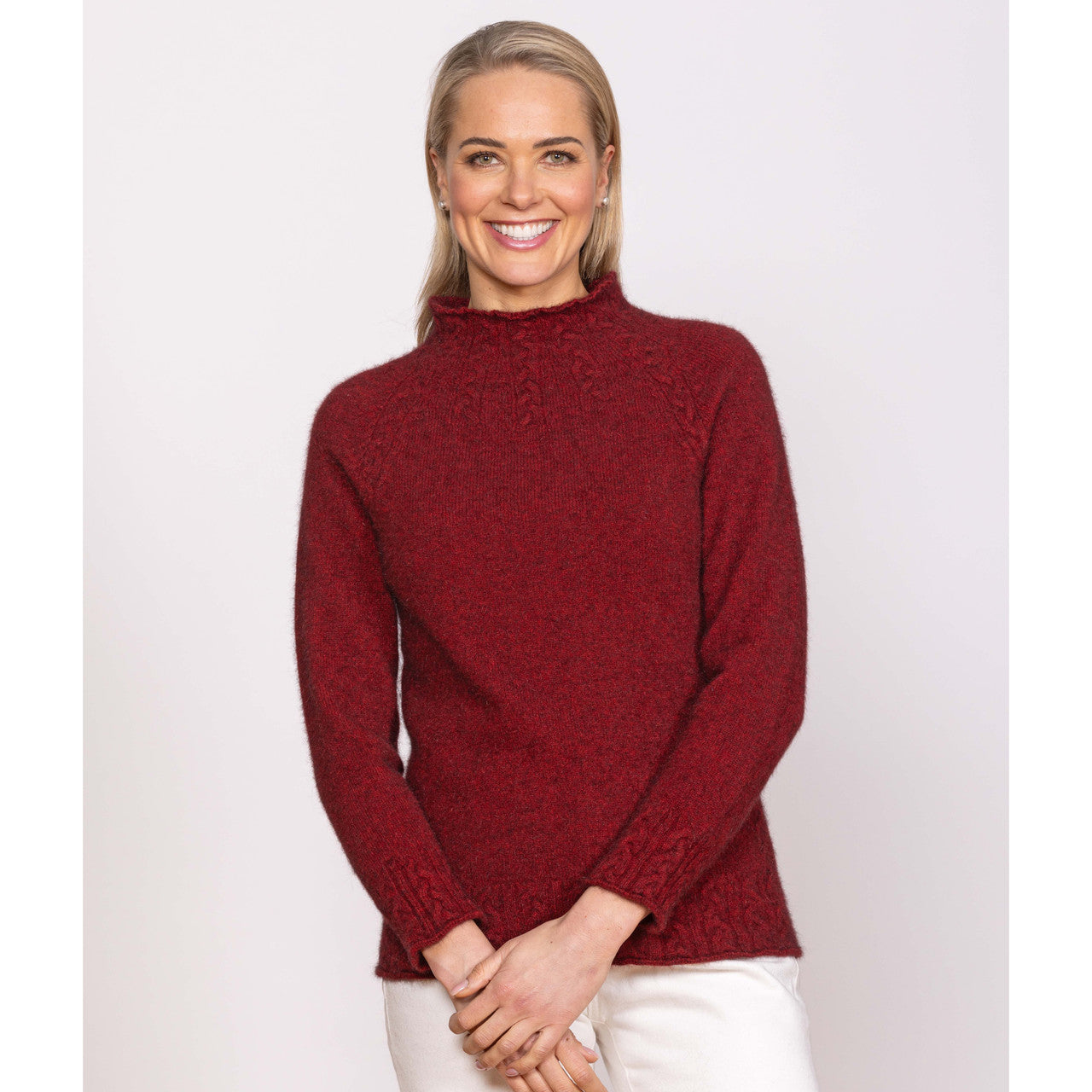 Woman wearing Noble Wilde - Merino & Possum Cable Funnel Neck (NW3221) in the colour Sangria