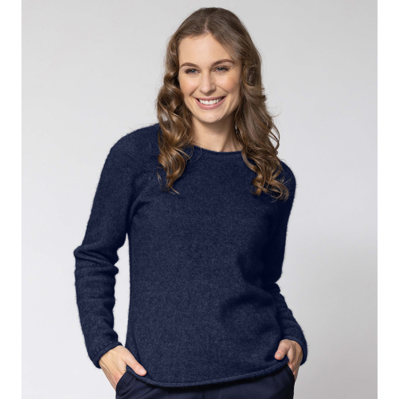 Woman wearing Noble Wilde - Merino and Possum Rutland Raglan Crew (NW3228) in the colour Maritime.