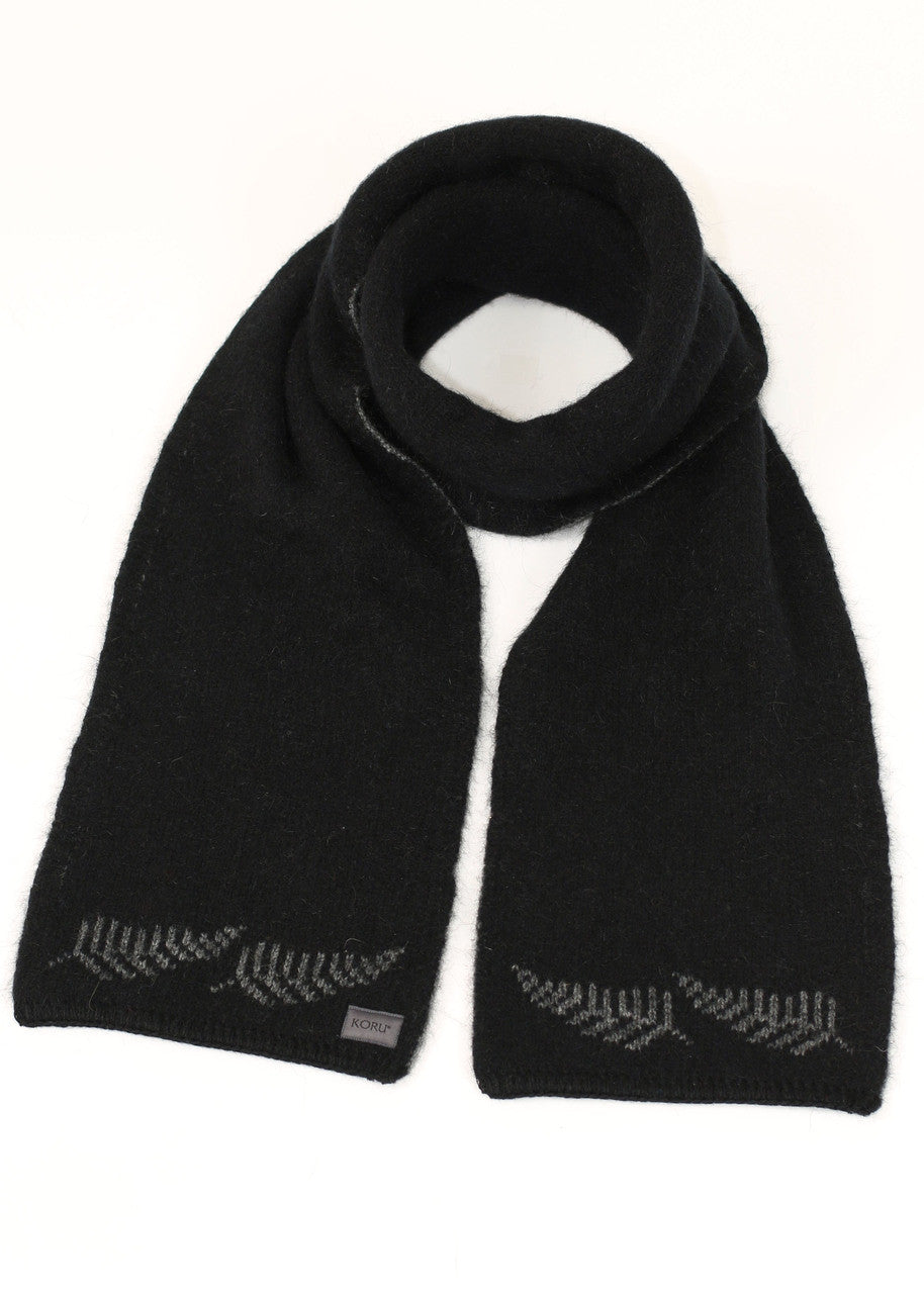 A black Koru merino and possum NZ Supporters Silver Fern Scarf.
