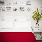 Cherry colour king wool blanket with co-ordinated stitch.