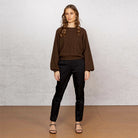 Woman wearing Noble Wilde - Merino & Possum Bellow Sleeve Top in the colour Tobago.