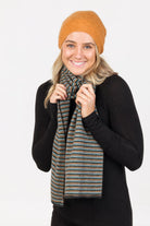 Woman wearing Native World - Merino & Possum Six Colour Scarf (NX894) in the colour combination Charcoal.