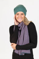 Woman wearing Native World - Merino & Possum Six Colour Scarf (NX894) in the colour combination Navy.