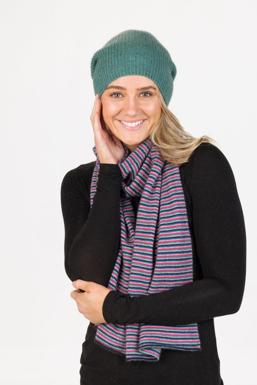 Woman wearing Native World - Merino & Possum Six Colour Scarf (NX894) in the colour combination Navy.