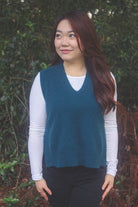 Woman wearing the Lothlorian - Merino & Possum Ride Vest (9650) in the colour Deep Cyan.